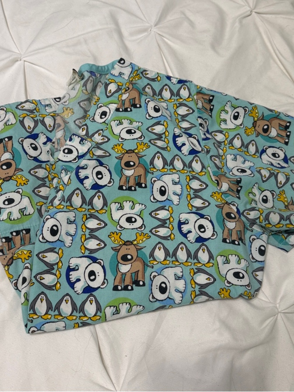 Winter penguin print scrub top